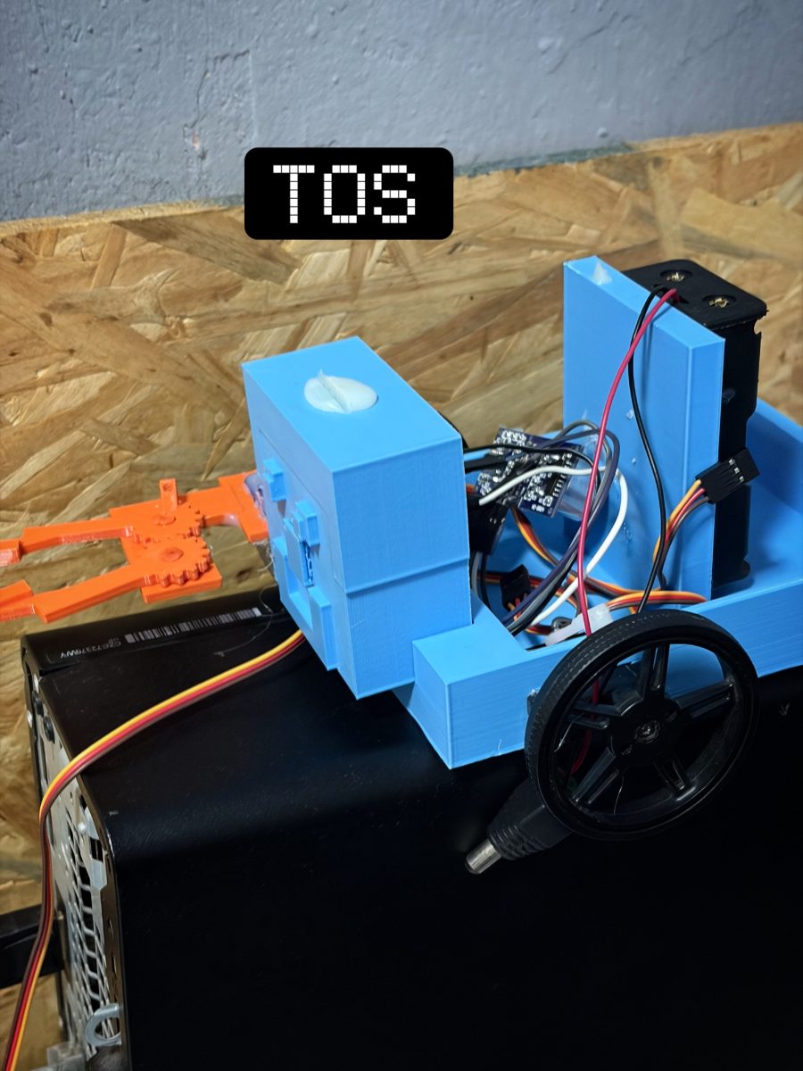 Vehículo con pinza robótica
